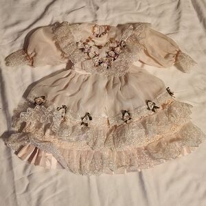 Elegant Lace Doll Dress with Floral Accents